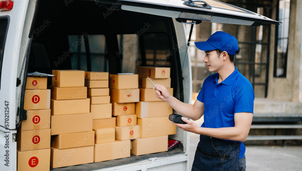 Portrait of courier delivery man searching the address on digital tablet. Delivery service, delivery home .