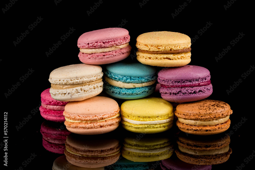 Colorful macaroon over black background Colorful macaroon over black background