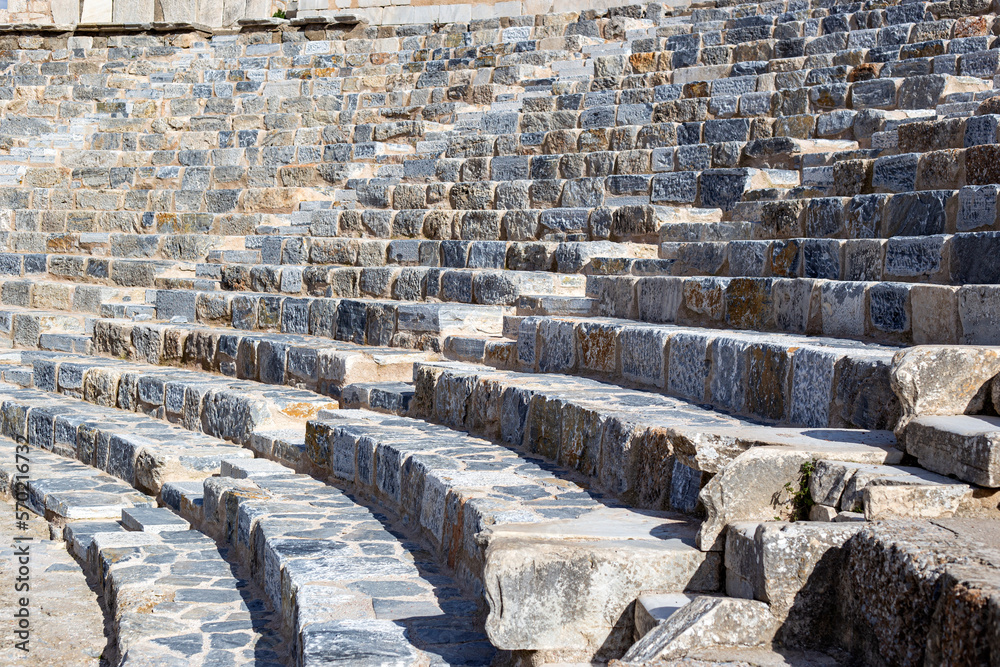 Amphitheater seats isolated in sunny day outdoor, Ephesus Ancient city, Turkey Amphitheater seats isolated in sunny day outdoor, Ephesus Ancient city, Turkey