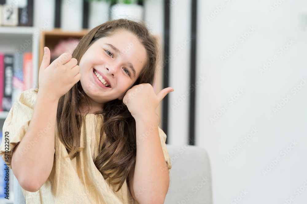 Happy child girl playing in the living room at home Happy child girl playing in the living room at home
