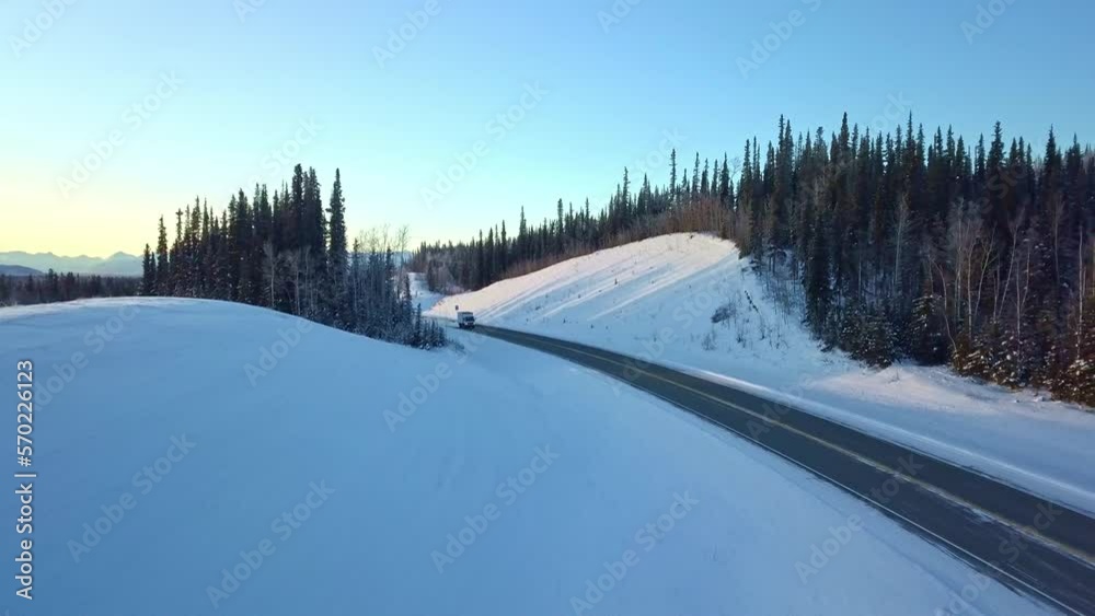 Exploring the majestic and snow-covered landscape of the Glenn Highway of Alaska, the view is breathtaking as you drive through this winter wonderland. Exploring the majestic and snow-covered landscape of the Glenn Highway of Alaska, the view is breathtaking as you drive through this winter wonderland.
