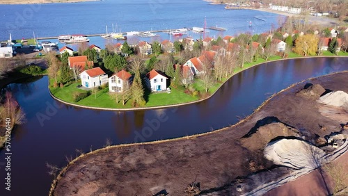 Retreat Shot of Dutch Holiday Homes on Small Island near Lake, Steendam photo