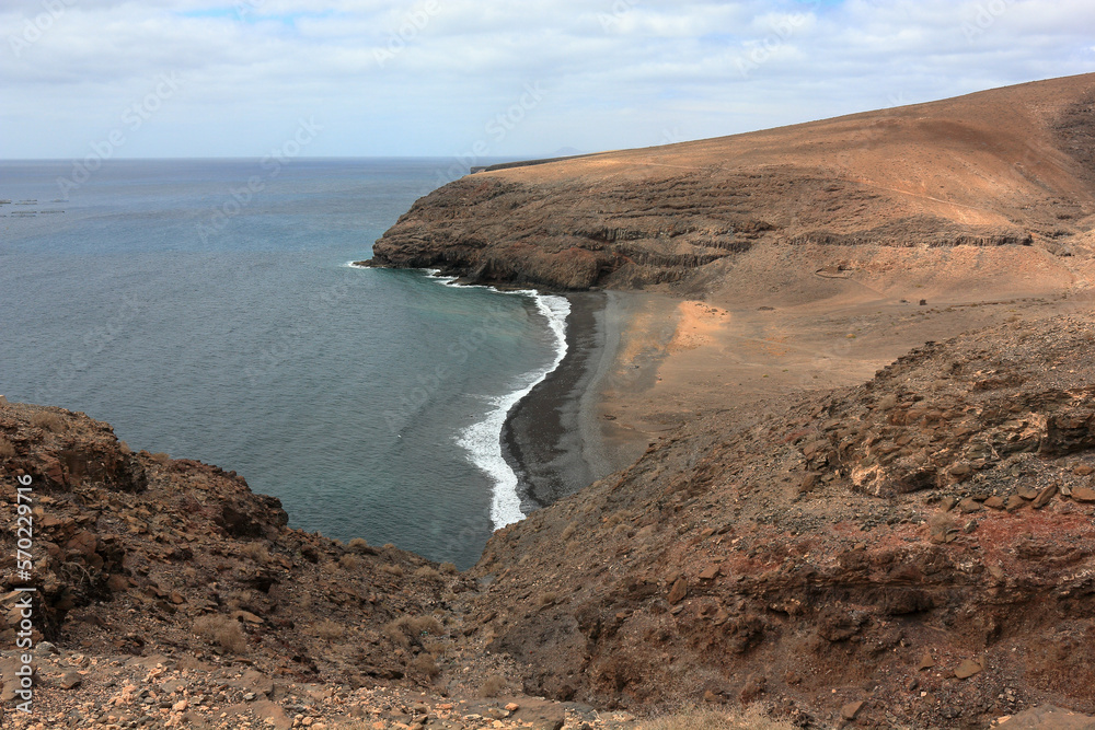 Playa del Pozo, a black beach in Lanzarote, Canary Islands, Spain. Playa del Pozo, a black beach in Lanzarote, Canary Islands, Spain.