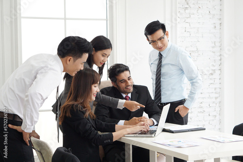 business team working together in office. Group of business people working in office and discussing new ideas