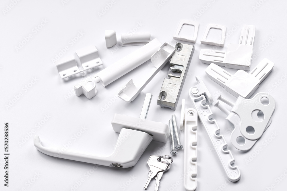 Fototapeta premium White plastic fittings for windows and doors isolated on white background