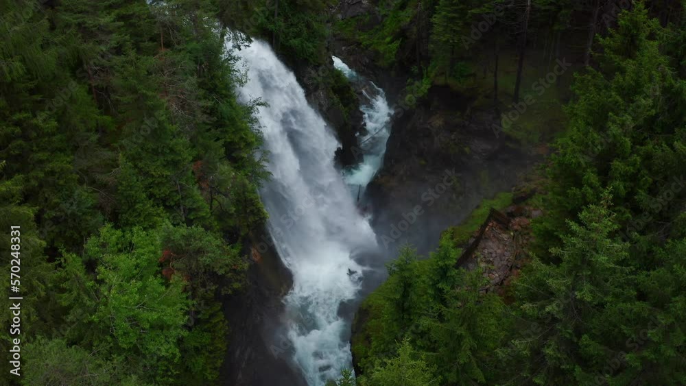 Aerial View Of Powerful Cascading Alpine Waterfalls Of Riva In The Dolomites. Dolly Forward, Establishing Shot