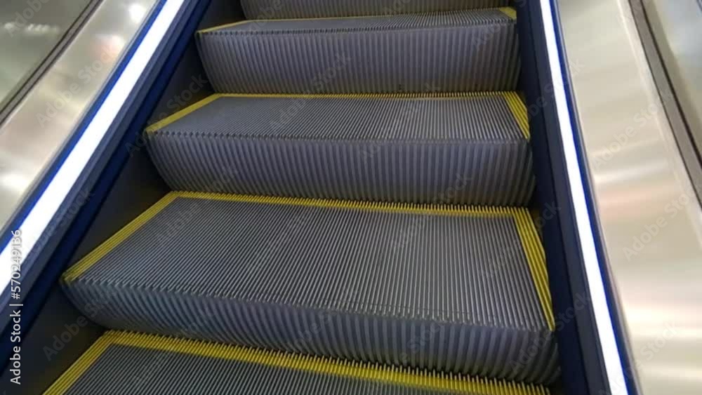 Metal escalators leading to the top Metal escalators leading to the top