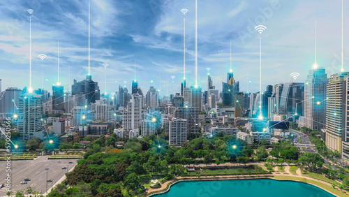 City scape with connecting dots for networking and communication in twilight.