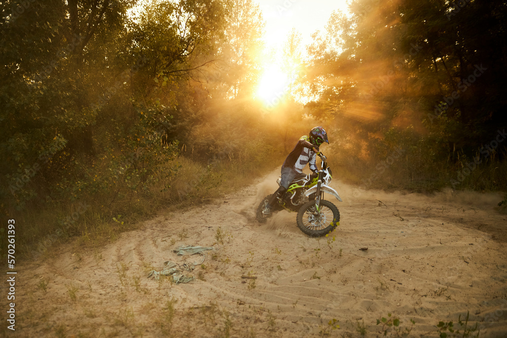 Enduro rider on an enduro motorcycle. Photo of an enduro rider. a ...