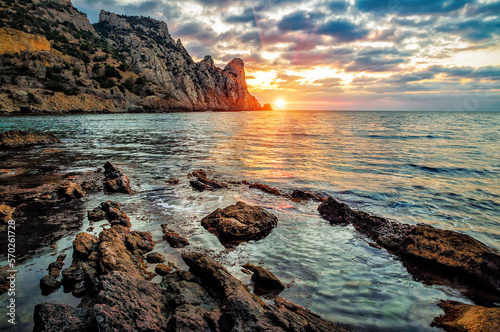 rocks and sea at beautiful sunset or sunrise