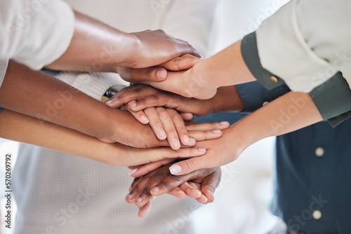 Teamwork  diversity and team stack of hands for celebration  motivation or partnership in office. Multiracial  collaboration and business people celebrating together for success  achievement or goal.