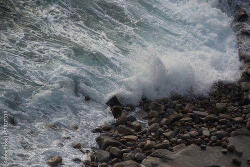 Fototapeta Naklejka Na Ścianę i Meble -  Powerful sea wave breaks on a rocky shore
