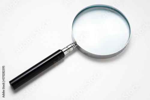 Magnifying Glass with Black Handle on a White Background