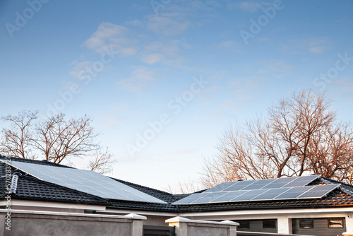 Wallpaper Mural Solar installation on the roof of residential building, single family house in serbia with photovolatic modules, also called Solar panels, used for electricity and power generation using sun energy.. Torontodigital.ca