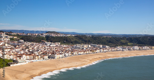Landscape of the empty beach in Nazare - Portugal