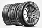 Car tires with a great profile in the car repair shop. Set of summer or winter tyres in front of white fond. On white PNG background
