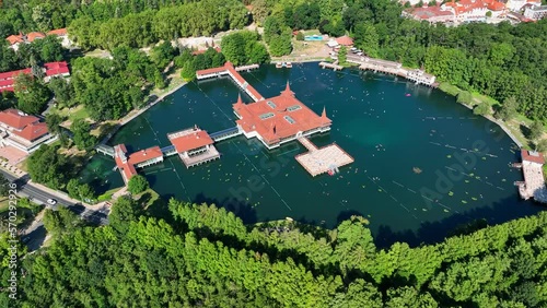 Aerial view of Heviz Lake in Hungary. Flying over Heviz lake spa - unique natural thermal water lake photo