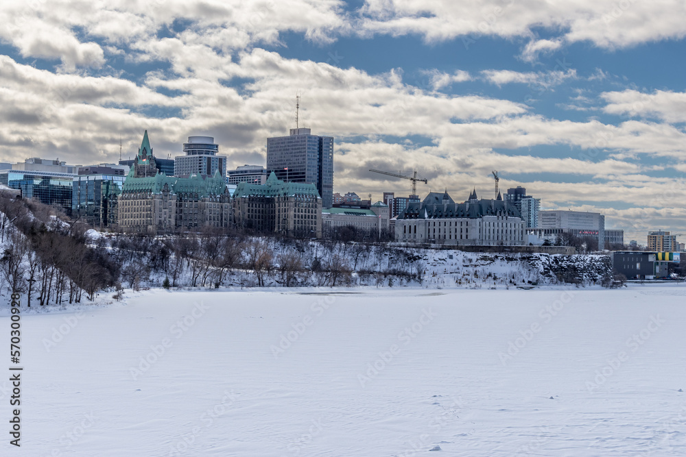 Having a walk through the Majors Hill Park in downtown Ottawa Canada with view to the historical buildings of the Canadian parliament and its surroundings at a cold but sunny day in winter. Having a walk through the Majors Hill Park in downtown Ottawa Canada with view to the historical buildings of the Canadian parliament and its surroundings at a cold but sunny day in winter.