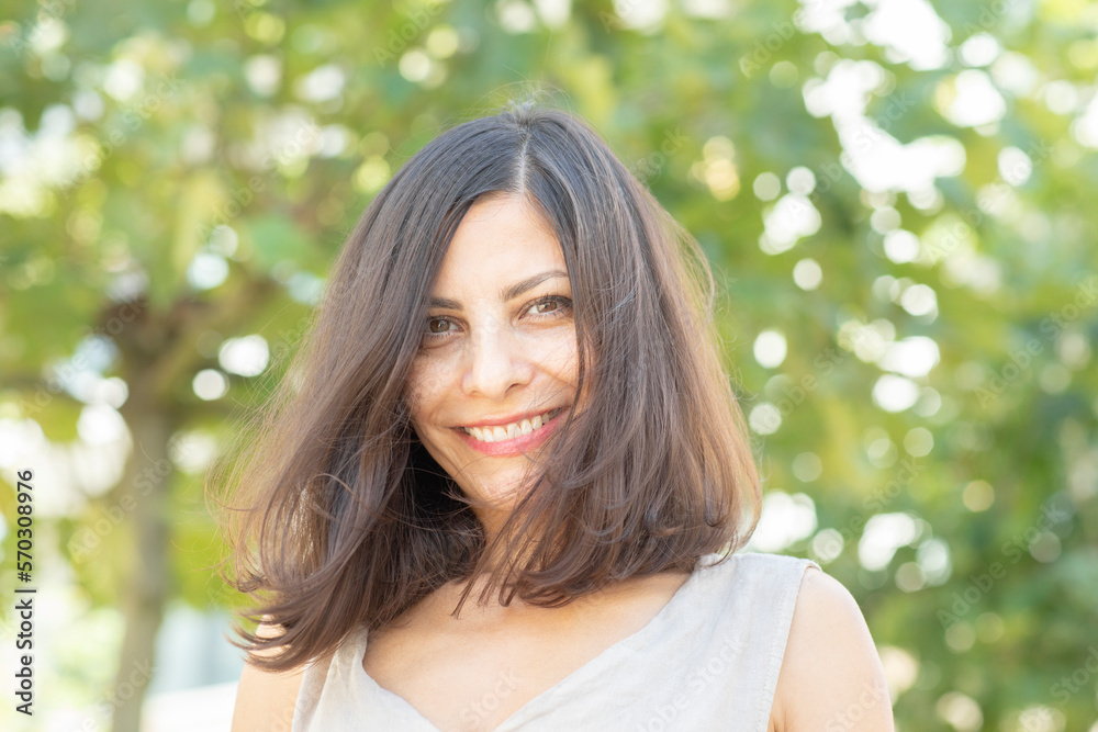 Portrait of smiling woman outdoors Portrait of smiling woman outdoors