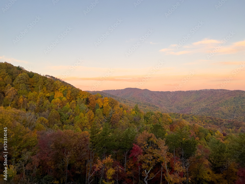 A view of the Blue Ridge Parkway in Boone, NC during the autumn fall color changing season sunset.