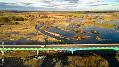 Canvastavla View from above on the bridge over the Narew River and its backwater on a sunny,day