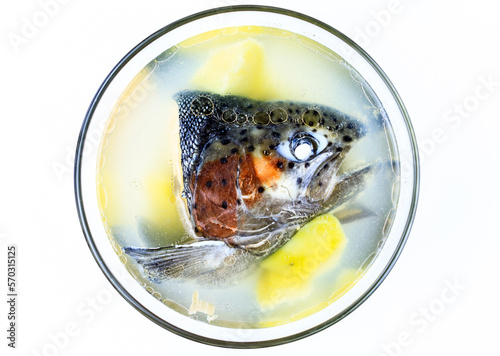 beautiful trout fish soup in a transparent plate