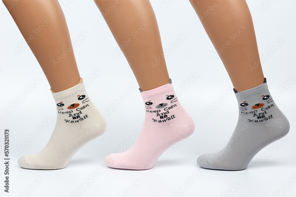 Socks on a white background. Socks on the leg. Socks on a white background. Socks on the leg.