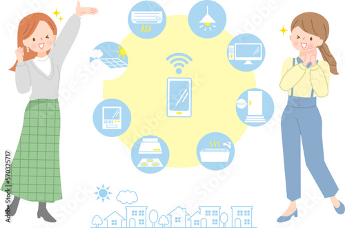 スマホで家電を遠隔操作する説明する女性達