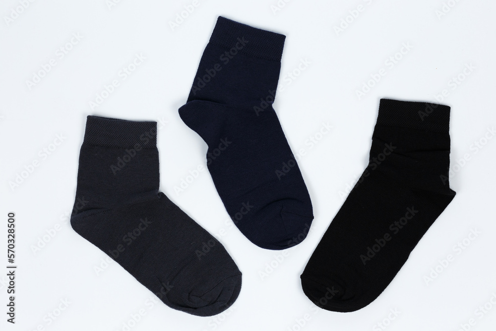 Socks on a white background. Socks on the leg. Socks on a white background. Socks on the leg.