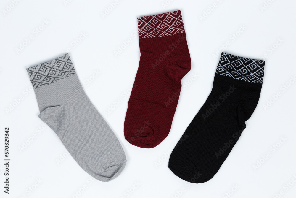 Socks on a white background. Socks on the leg. Socks on a white background. Socks on the leg.