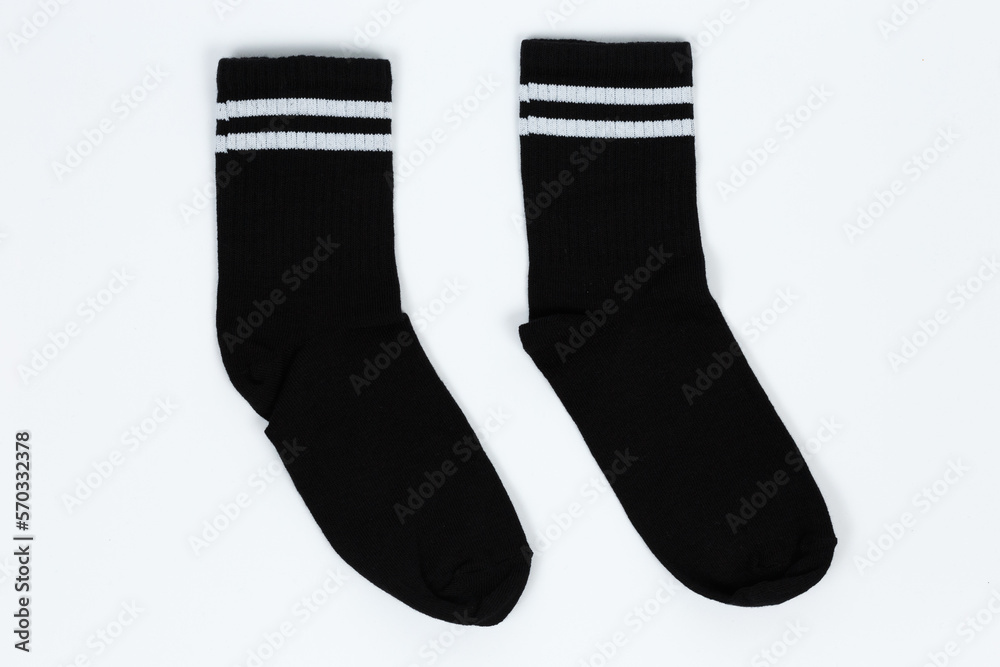 Socks on a white background. Socks on the leg. Socks on a white background. Socks on the leg.