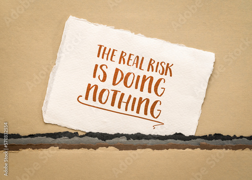 the real risk is doing nothing - inspirational reminder, procrastination and personal development concept