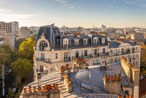 Leinwand Poster Aerial view of the roofs of Paris, France typical Haussmann building