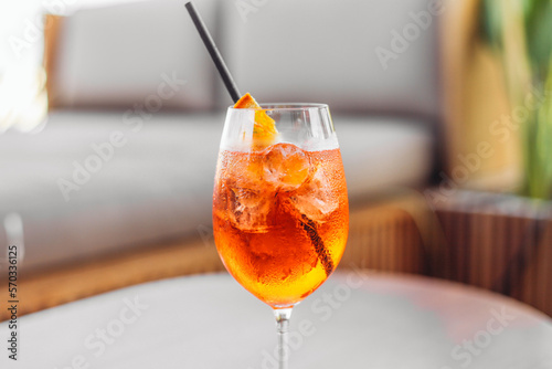 Wallpaper Mural A glass of orange cocktail Spritz on a table in a bar Torontodigital.ca