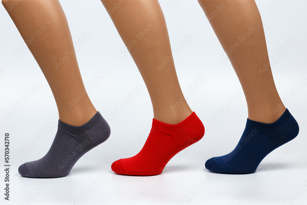 Socks on a white background. Socks on the leg. Socks on a white background. Socks on the leg.