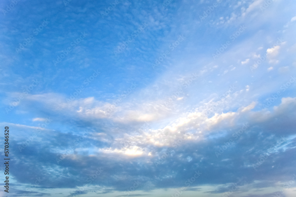 Soft white blurred clouds on a gentle blue sky on a sunny day. Wallpaper. Background. Beauty in nature Soft white blurred clouds on a gentle blue sky on a sunny day. Wallpaper. Background. Beauty in nature