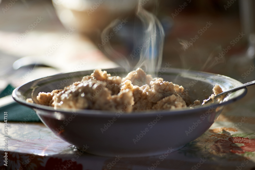 Photo of hot oatmeal in a bowl Photo of hot oatmeal in a bowl