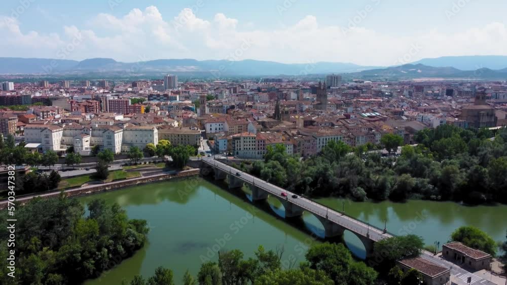 Aerial point of view of Logrono city. View of Ebro River and Puente de Piedra bridge. View of the city center of Logrono. Drone backward and tilt down. Beautiful panoramic view of all region Aerial point of view of Logrono city. View of Ebro River and Puente de Piedra bridge. View of the city center of Logrono. Drone backward and tilt down. Beautiful panoramic view of all region