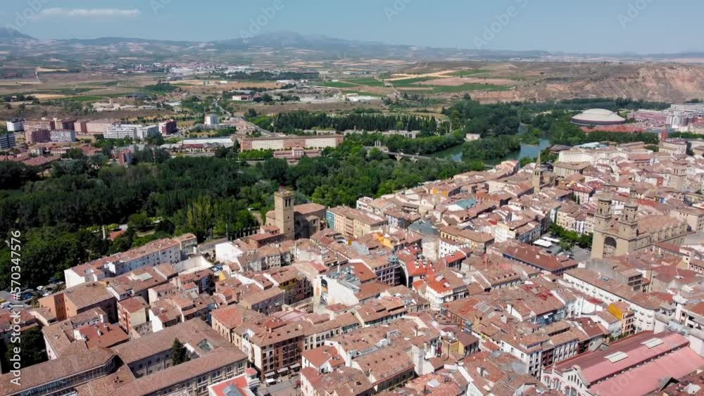 Drone forward over the city of Logrono. Rooftop view of this famous and historic city, capital of La Rioja Province. View of Ebro river. View of Ebro River and Puente de Piedra bridge. Drone forward over the city of Logrono. Rooftop view of this famous and historic city, capital of La Rioja Province. View of Ebro river. View of Ebro River and Puente de Piedra bridge.