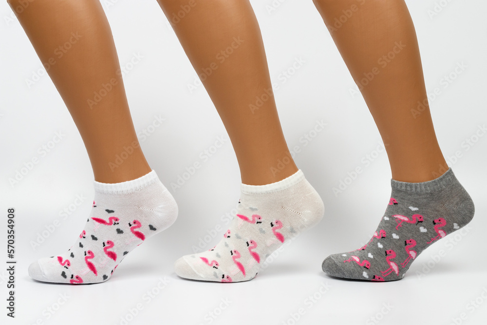 Socks on a white background. Socks on the leg. Socks on a white background. Socks on the leg.