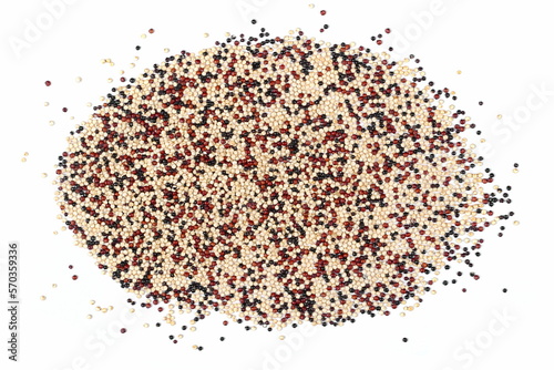 Tri-color quinoa seeds blend pile isolated on white background, top view