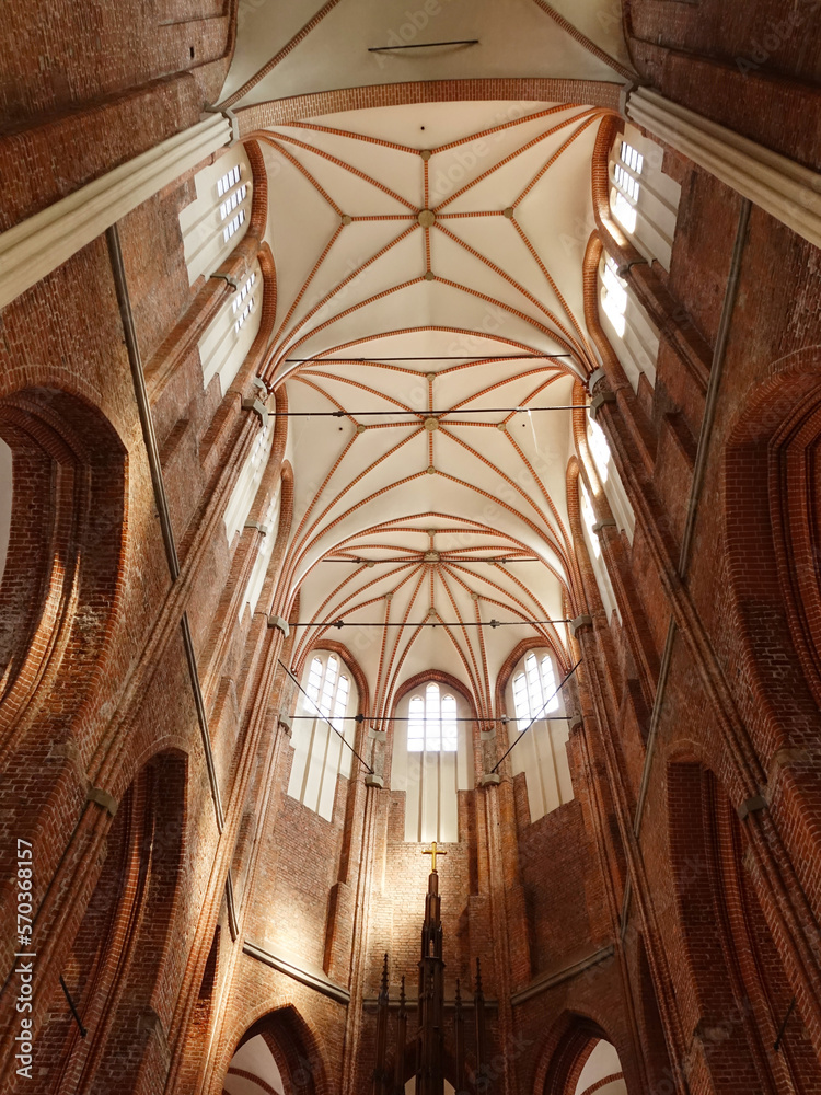 The interior of St Peter's Church in Riga with vaulted ceiling