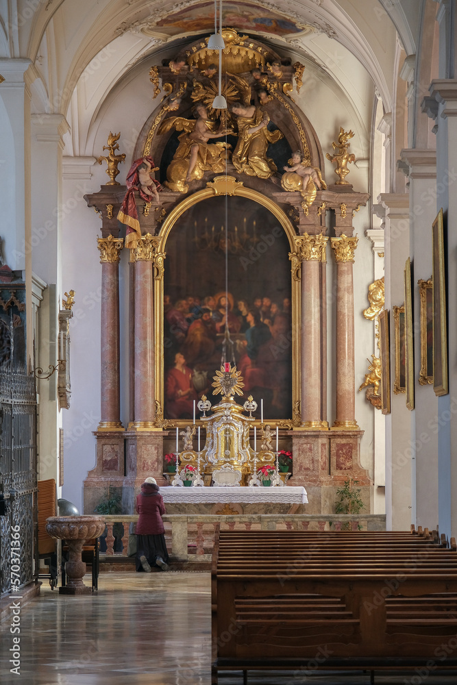 Magnificent opulent splendid Bavarian baroque church cathedral basilica interiors with stucco, murals, altar, Pilars, ceiling paintings, gold, wood domes nave	