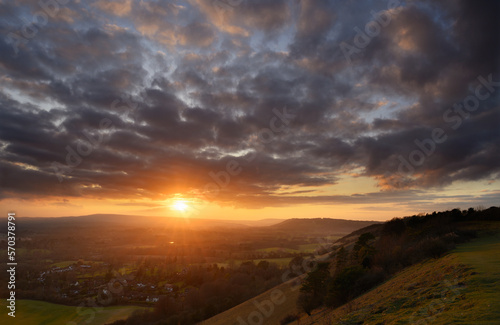 Glowing sunset view from Colley Hill between Reigate and Dorking in Surrey, UK. Surrey Hills area of Outstanding Natural Beauty on the North Downs. Looking towards Leith Hill on the Greensand Ridge. © Jonathan Wilson