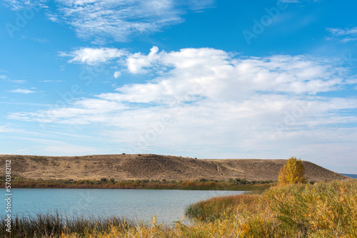 Recreational trail around Mack Mesa Lake in Highline Lake State Park  western Colorado on a sunny day in early autumn