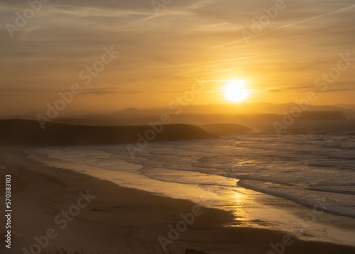 Sunset on a beach in Asturias. Xago Beach