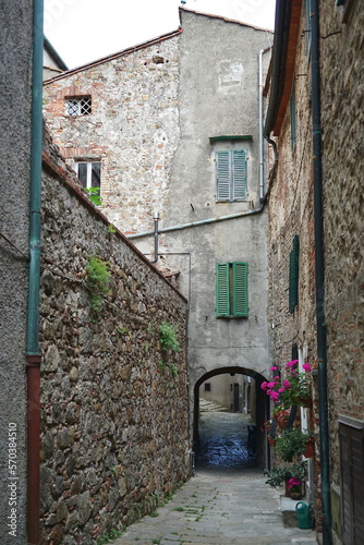 Alley in the ancient village of Chiusdino, Tuscany, Italy