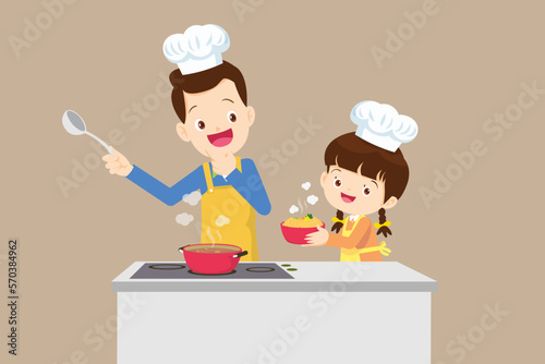 happy family with father and children girl cooking in kitchen