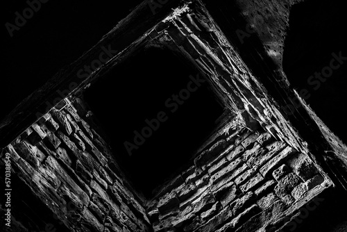 Geometrical dark indoor wall, like prison or dungeon, black and white, ruins exploration