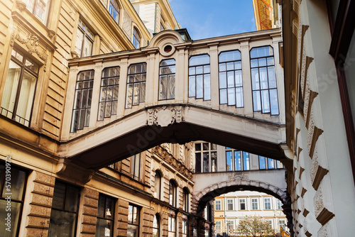 Photography Ornamental bridges between buildings in Prague